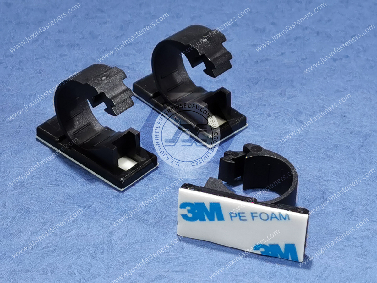 Nylon Black Locking Clamp on Adhesive Base Nylon Black Locking Clamp on Adhesive Base